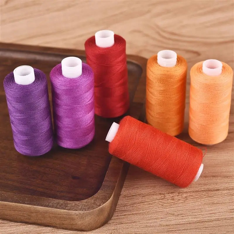 Set of 6 colorful thread spools from The LaceMaker Diary, showcasing vibrant, neatly wound sewing or embroidery threads.