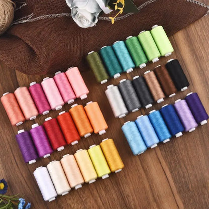 Set of 6 colorful thread spools from The LaceMaker Diary, showcasing vibrant, neatly wound embroidery threads.